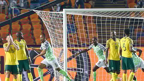 Nigerian players celebrate after a goal during the African Cup of Nations s quarterfinal soccer match between Nigeria and South Africa in Cairo International Stadium, Egypt, Wednesday, July 10, 2019 . (AP Photo/Ariel Schalit)