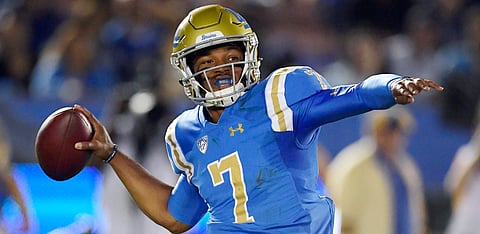 UCLA quarterback Dorian Thompson-Robinson passes against Arizona on Oct. 20, 2018 (Mark Terrill)