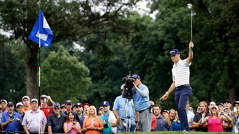 Justin Thomas celebrates as he makes a birdie on the 14th hole during the third round of the BMW Championship golf tournament at Medinah Country Club, Saturday, Aug. 17, 2019, in Medinah, Ill. (AP Photo/Nam Y. Huh)