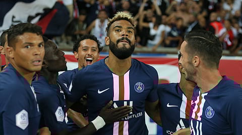 PSG's Eric Maxim Choupo-Moting, center, celebrates with teammates after scoring his sides first goal during the French League One soccer match between Paris Saint Germain and Toulouse at the Parc des Princes Stadium in Paris, France, on Sunday, Aug. 25, 2019. (AP Photo/David Vincent)