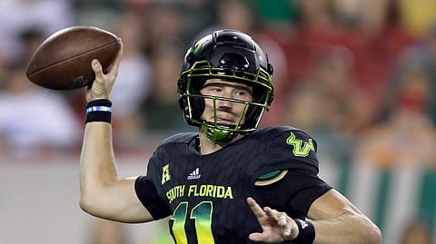 FILE - In this Oct. 20, 2018, file photo, South Florida quarterback Blake Barnett is shown during the second half of an NCAA college football game against Connecticut, in Tampa, Fla. No. 19 Wisconsin plays at South Florida on Friday, Aug. 31, 2019. (AP Photo/Chris O'Meara, File)