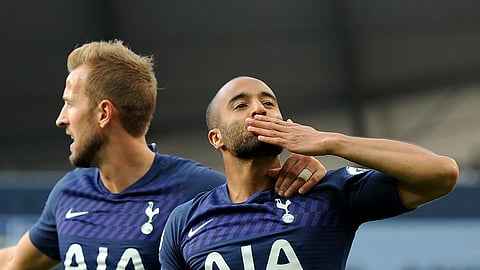 Tottenham's Lucas Moura, right, celebrates with Tottenham's Harry Kane, left, after scoring his side's second goal during the English Premier League soccer match between Manchester City and Tottenham Hotspur at Etihad stadium in Manchester, England, Saturday, Aug. 17, 2019.
