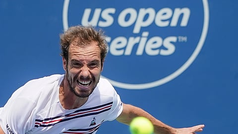 Richard Gasquet, of France, serves to Roberto Bautista Agut, of Spain, during the Western & Southern Open tennis tournament, Friday, Aug. 16, 2019, in Mason, Ohio. (AP Photo/John Minchillo)