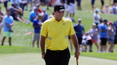 Patrick Reed approaches the fourth green during the Northern Trust golf tournament at Liberty National Golf Course, Saturday, Aug. 10, 2019 in Jersey City, N.J. (Chris Pedota/The Record via AP)