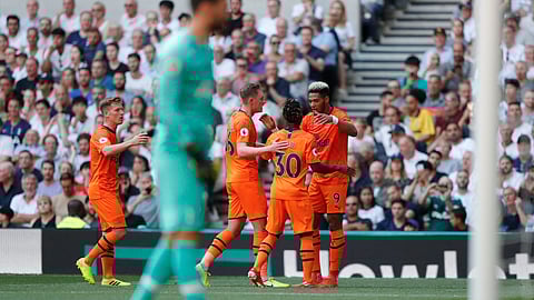 Newcastle's Joelinton, right, celebrates after scoring his side's first goal during the English Premier League soccer match between Tottenham Hotspur and Newcastle United at Tottenham Hotspur Stadium in London, Sunday, Aug. 25, 2019.