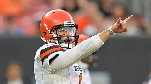 Cleveland Browns quarterback Baker Mayfield gives a signal during the first half of the team's NFL preseason football game against the Washington Redskins, Thursday, Aug. 8, 2019, in Cleveland.