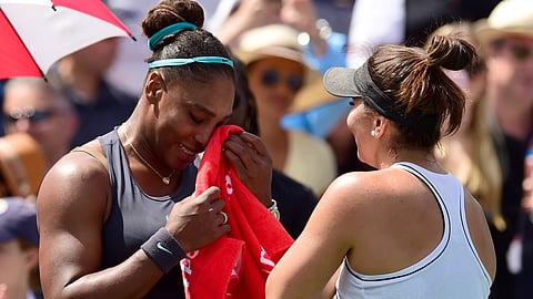 Canada's Bianca Andreescu, right, consoles Serena Williams, of the United States, after Williams had to retire from the final of the Rogers Cup tennis tournament in Toronto, Sunday, Aug. 11, 2019.