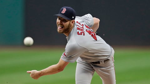 Boston Red Sox starting pitcher Chris Sale delivers in the first inning of the team's baseball game against the Cleveland Indians, Tuesday, Aug. 13, 2019, in Cleveland. (AP Photo/Tony Dejak)