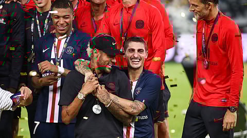 Paris Saint-Germain players Neymar, left at front, and Marco Verratti, right at front, celebrate after winning their match against Rennes in the Trophee des Champions in Shenzhen in southern China's Guangdong province on Aug. 3, 2019.