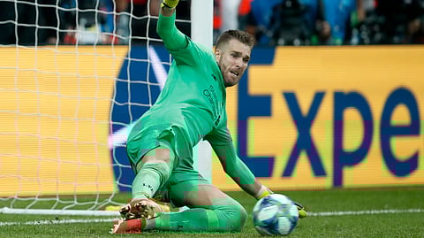 Liverpool's goalkeeper Adrian stops a penalty shot from Chelsea's Tammy Abraham during the UEFA Super Cup soccer match between Liverpool and Chelsea, in Besiktas Park, in Istanbul on Aug. 15, 2019.