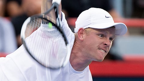 Kyle Edmund, of Britain, serves to Nick Kyrgios, of Australia, during the Rogers Cup men’s tennis tournament Tuesday, Aug. 6, 2019, in Montreal. (Paul Chiasson/The Canadian Press via AP)