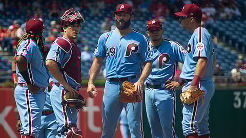 J.T. Realmuto (second from left) has started 93 games behind the plate for the Phillies this season (Chris Szagola)