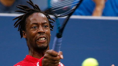 Gael Monfils, of France, returns a shot to Pablo Andujar, of Spain, during the fourth round of the U.S. Open tennis tournament, Monday, Sept. 2, 2019, in New York. (AP Photo/Jason DeCrow)
