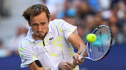 Daniil Medvedev, of Russia, returns a shot to Stan Wawrinka, of Switzerland, during the quarterfinals of the US Open tennis championships Tuesday, Sept. 3, 2019, in New York. (AP Photo/Sarah Stier)