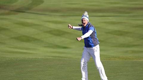 Suzann Pettersen of Europe celebrates after holing a putt on the 18th green to win the Solheim cup against the US at Gleneagles, Auchterarder, Scotland, Sunday, Sept. 15, 2019. (AP Photo/Peter Morrison)