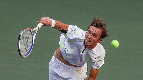Daniil Medvedev, of Russia, serves to Stan Wawrinka, of Switzerland, during the quarterfinals of the US Open tennis championships Tuesday, Sept. 3, 2019, in New York. (AP Photo/Frank Franklin II)