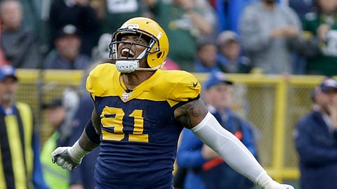 Green Bay Packers outside linebacker Preston Smith celebrates after the Denver Broncos turned over the ball on downs near the end of the second half of an NFL football game Sunday, Sept. 22, 2019, in Green Bay, Wis.