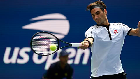 Roger Federer, of Switzerland, returns to David Goffin, of Belgium, during the fourth round of the US Open tennis championships Sunday, Sept. 1, 2019, in New York.