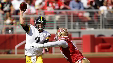 Pittsburgh Steelers quarterback Mason Rudolph (2) passes as he is pressured by San Francisco 49ers defensive end Arik Armstead during the second half of an NFL football game in Santa Clara, Calif., Sunday, Sept. 22, 2019. (AP Photo/Ben Margot)