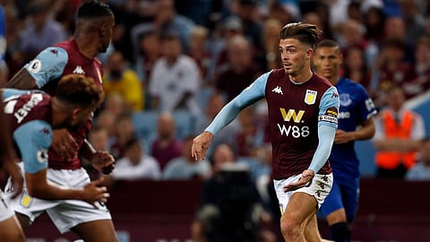 Aston Villa's Jack Grealish controls the ball during the English Premier League soccer match between Aston Villa and Everton at Villa Park in Birmingham, England, Friday, Aug. 23, 2019.