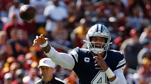 Dallas Cowboys quarterback Dak Prescott (4) passes downfield during the second half of an NFL football game, Sunday, Sept. 15, 2019, in Landover, Md. (AP Photo/Alex Brandon)