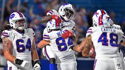 Bills teammates celebrate a preseason touchdown against the Colts on Aug. 8 (Adrian Kraus)