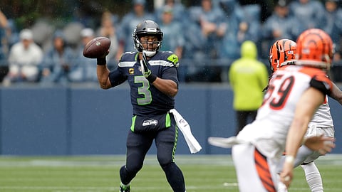 Seattle Seahawks quarterback Russell Wilson passes against the Cincinnati Bengals during the second half of an NFL football game Sunday, Sept. 8, 2019, in Seattle. (AP Photo/Stephen Brashear)