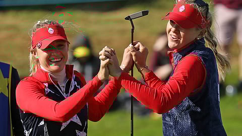 Sisters Nelly, left, and Jessica Korda of the US celebrate on the 14th after winning their Foursomes match 6 up against Solheim cup at Gleneagles, Auchterarder, Scotland, Friday, Sept. 13, 2019. The Solheim cup runs from 13-15 Sept.