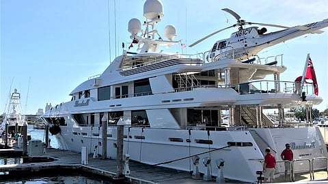 Billionaire Tilman Fertitta's mega-yacht, Boardwalk, sits at the Frank S. Farley State Marina adjacent to Golden Nugget Atlantic City, where the casino's owner was hyping his new book Saturday afternoon.