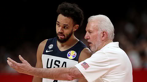 United States' coach Gregg Popovich, right instructs United States' Derrick White during a match against Brazil for the FIBA Basketball World Cup at the Shenzhen Bay Sports Center in Shenzhen on Monday, Sept. 9, 2019.