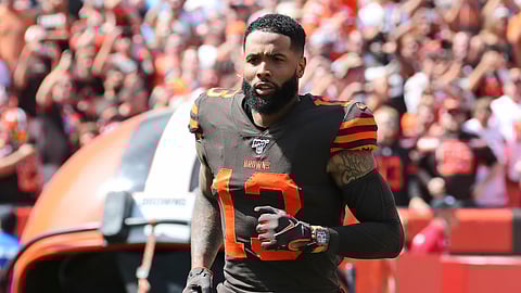 In this Sunday, Sept. 8, 2019, file photo, Cleveland Browns wide receiver Odell Beckham Jr. is introduced as he runs out on the field before an NFL football game against the Tennessee Titans, in Cleveland.