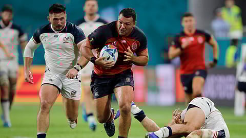 England's Ellis Genge runs during the Rugby World Cup Pool C game at Kobe Misaki Stadium against the United States in Kobe, Japan, Thursday, Sept. 26, 2019. (AP Photo/Christophe Ena)