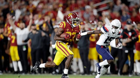 Southern California running back Kenan Christon (23) scores a rushing touchdown past Arizona cornerback McKenzie Barnes (15) during the second half of an NCAA college football game Saturday, Oct. 19, 2019, in Los Angeles.