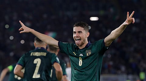 Italy's Jorginho celebrates after he scores the opening goal of the game from the penalty spot during the Euro 2020 group J qualifying soccer match between Italy and Greece in Rome, Italy, Saturday, Oct. 12, 2019. (AP Photo/Alessandra Tarantino)