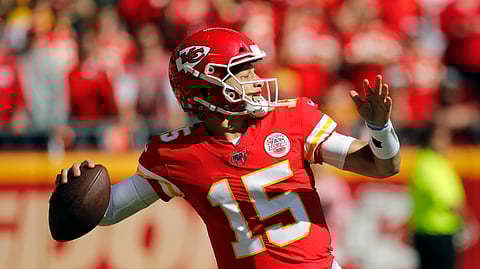 Kansas City Chiefs quarterback Patrick Mahomes (15) throws a pass during the first half of an NFL football game against the Houston Texans in Kansas City, Mo., Sunday, Oct. 13, 2019.