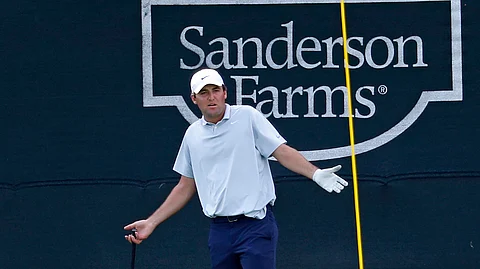 Scottie Scheffler reacts to his chip shot on the 18th hole during the second round of the Sanderson Farms Championship golf tournament in Jackson, Miss., Friday, Sept. 20, 2019.