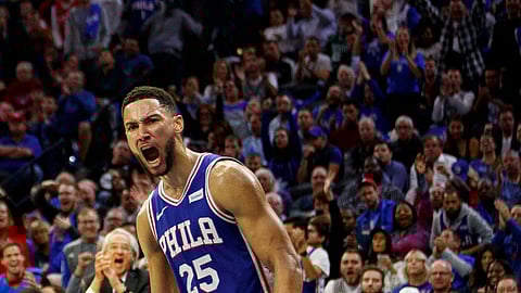 Philadelphia 76ers' Ben Simmons reacts to his dunk during the first half of the team's NBA basketball game against the Boston Celtics, Wednesday, Oct. 23, 2019, in Philadelphia. (AP Photo/Chris Szagola)