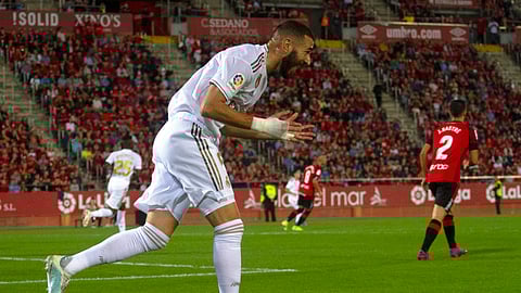 Real Madrid's Karim Benzema reacts during the Spanish La Liga soccer match between Mallorca and Real Madrid at the Iberostar Estadi in Palma de Mallorca, Spain, Saturday, Oct. 19, 2019. (AP Photo/Francisco Ubilla)