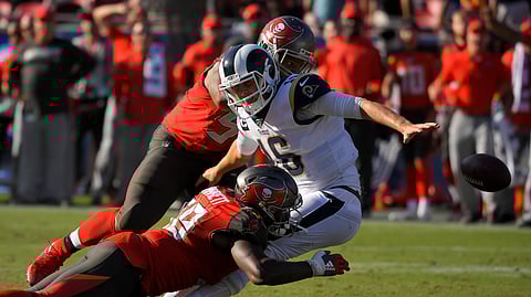 Tampa Bay Buccaneers linebacker Shaquil Barrett forces a fumble by Los Angeles Rams quarterback Jared Goff during the second half of an NFL football game Sunday, Sept. 29, 2019, in Los Angeles. The fumble was returned by a touchdown by the Buccaneers.