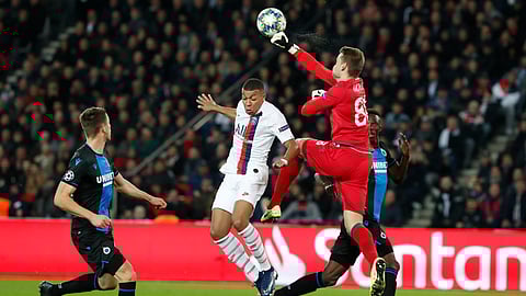 Club Brugge goalkeeper Simon Mignolet blocks the ball during a Champions League group A soccer match between Paris Saint Germain and Club Brugge, at the Parc des Princes stadium, in Paris, Wednesday, Nov. 6, 2019.