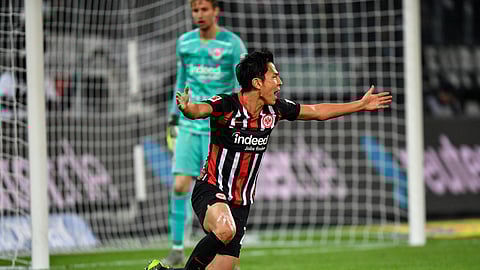 Frankfurt's Daichi Kamada reacts disappointed during the German Bundesliga soccer match between Borussia Moenchenglabach and Eintracht Frankfurt in Moenchengladbach, Germany, Sunday Oct. 27, 2019. Frankfurt was defeated 2-4. (AP Photo/Martin Meissner)