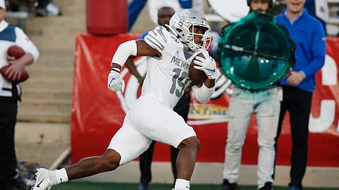 Memphis running back Kenneth Gainwell (19) carries for a touchdown in the first half of an NCAA college football game against Tulsa in Tulsa, Okla., Saturday, Oct. 26, 2019. (AP Photo/Sue Ogrocki)