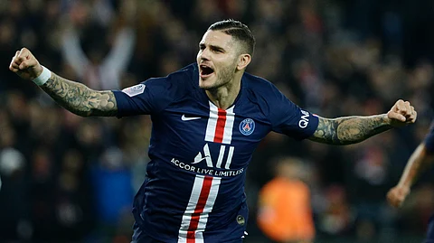 PSG's Mauro Icardi celebrates after scoring the second goal during the French League One soccer match between PSG and Marseille at the Parc des Princes stadium in Paris, France, Sunday, Oct. 27, 2019.