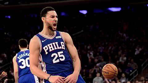 Philadelphia 76ers guard Ben Simmons (25) celebrates his dunk against the New York Knicks during the second half of an NBA basketball game Friday, Nov. 29, 2019, in New York. (AP Photo/Steven Ryan)