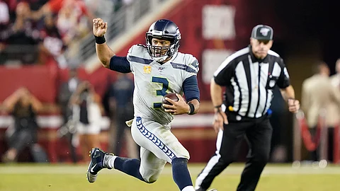 Seattle Seahawks quarterback Russell Wilson (3) runs the ball against the San Francisco 49ers in Santa Clara, Calif., Monday, Nov. 11, 2019. Can the Eagles D slow him down? (AP Photo/Tony Avelar)