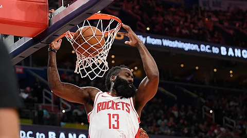 Houston Rockets guard James Harden (13) dunks against the Washington Wizards during the first half of an NBA basketball game, Wednesday, Oct. 30, 2019, in Washington. (AP Photo/Nick Wass)
