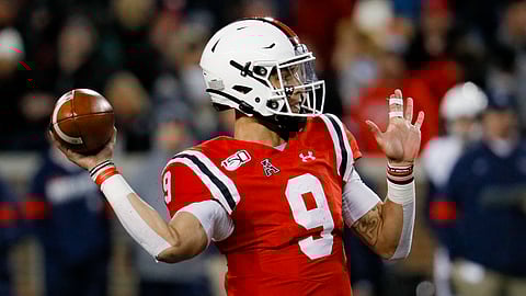 Cincinnati quarterback Desmond Ridder passes during the second half of an NCAA college football game against Connecticut, Saturday, Nov. 9, 2019, in Cincinnati.