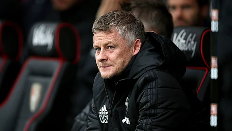 Manchester United manager Ole Gunnar Solskjaer watches the English Premiership soccer match against Bournemouth at The Vitality Stadium, Bournemouth, England, Saturday Nov. 2, 2019.