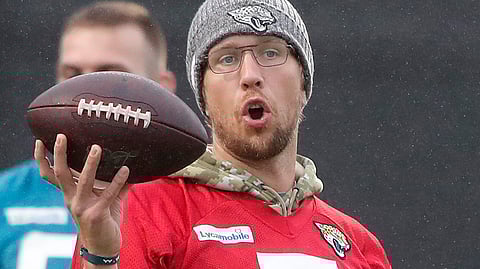 Jaguars QB Nick Foles holds a ball during a NFL training session of the Jacksonville Jaguars at the at Allianz Park in London, Friday, Nov. 1, 2019.