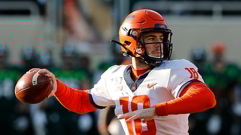 Illinois quarterback Brandon Peters throws during the first half of an NCAA college football game against Michigan State, Saturday, Nov. 9, 2019, in East Lansing, Mich. (AP Photo/Carlos Osorio)